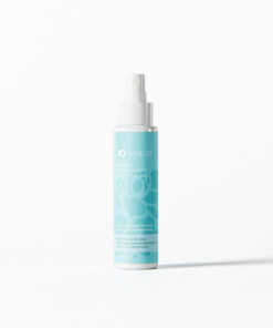 JO Balance Intimate Mist 2 oz spray bottle with fine rosewater mist on a soft pastel background
