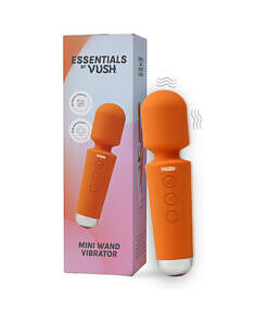 VUSH Essentials Mini Wand Vibrator in buttery-soft silicone with an ergonomic handle held against a clean