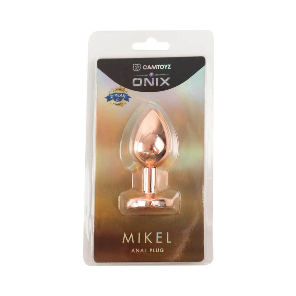 Camtoyz Copper Anal Plug Mikel laying on a dark satin surface