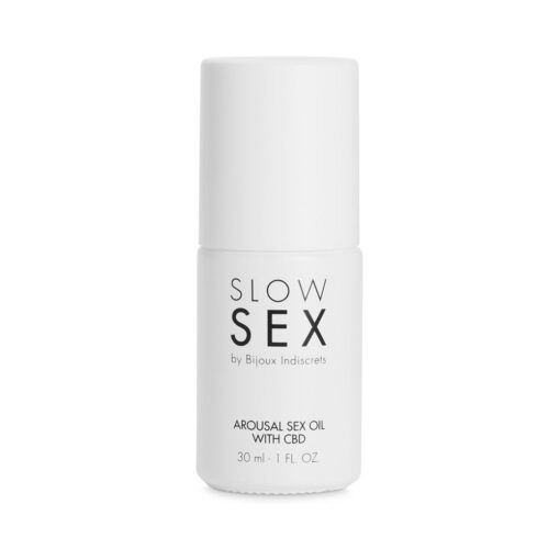 highlighting golden oil and Bijoux Indiscrets branding.