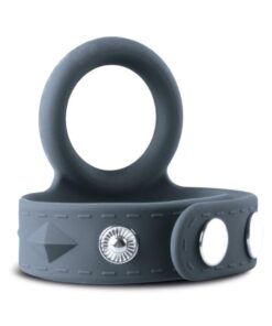 Boners Cock and Ball Strap with black silicone cock ring and adjustable ball strap with snap fasteners on a white surface