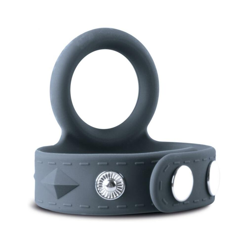 Boners Cock and Ball Strap with black silicone cock ring and adjustable ball strap with snap fasteners on a white surface
