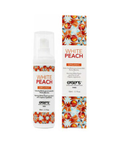 Exsens Warming Massage Oil White Peach 1.7 oz bottle with white peach illustration on a soft bedroom setting